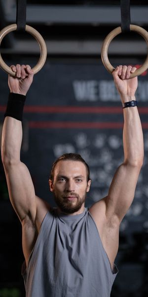 A person holding a steady core pose, demonstrating strength.